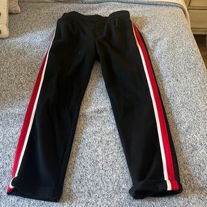 Women’s pants in black with red and white stripe